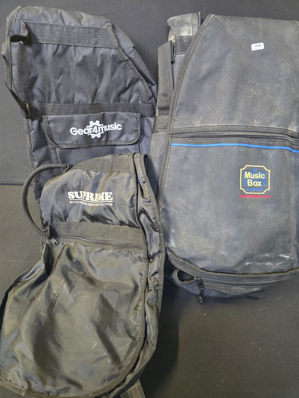 Lot 714: Three various brands and sized guitar bags