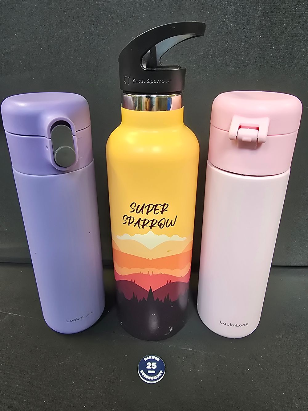 Lot 739: Three various water bottles