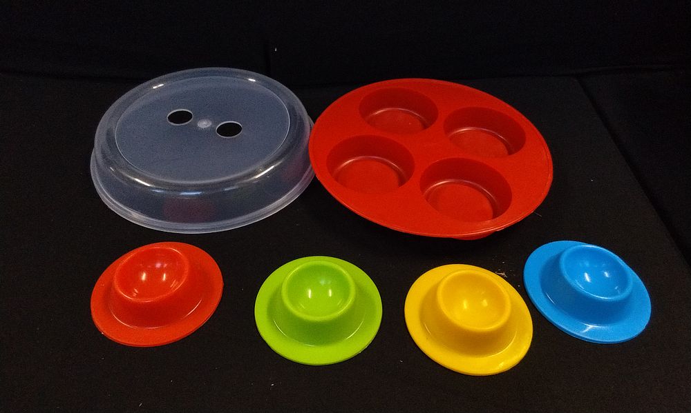 Lot 743: Microwave Egg Poacher Set.