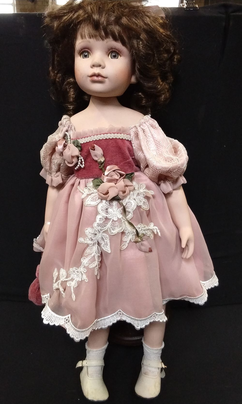Lot 761: Large Porcelain Doll on Metal Stand
