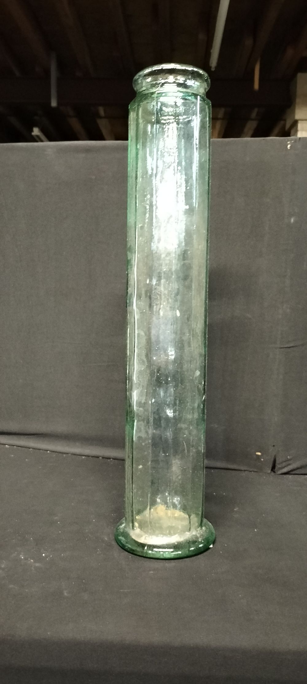 Lot 273: A Tall Cylindrical Green Glass Vase