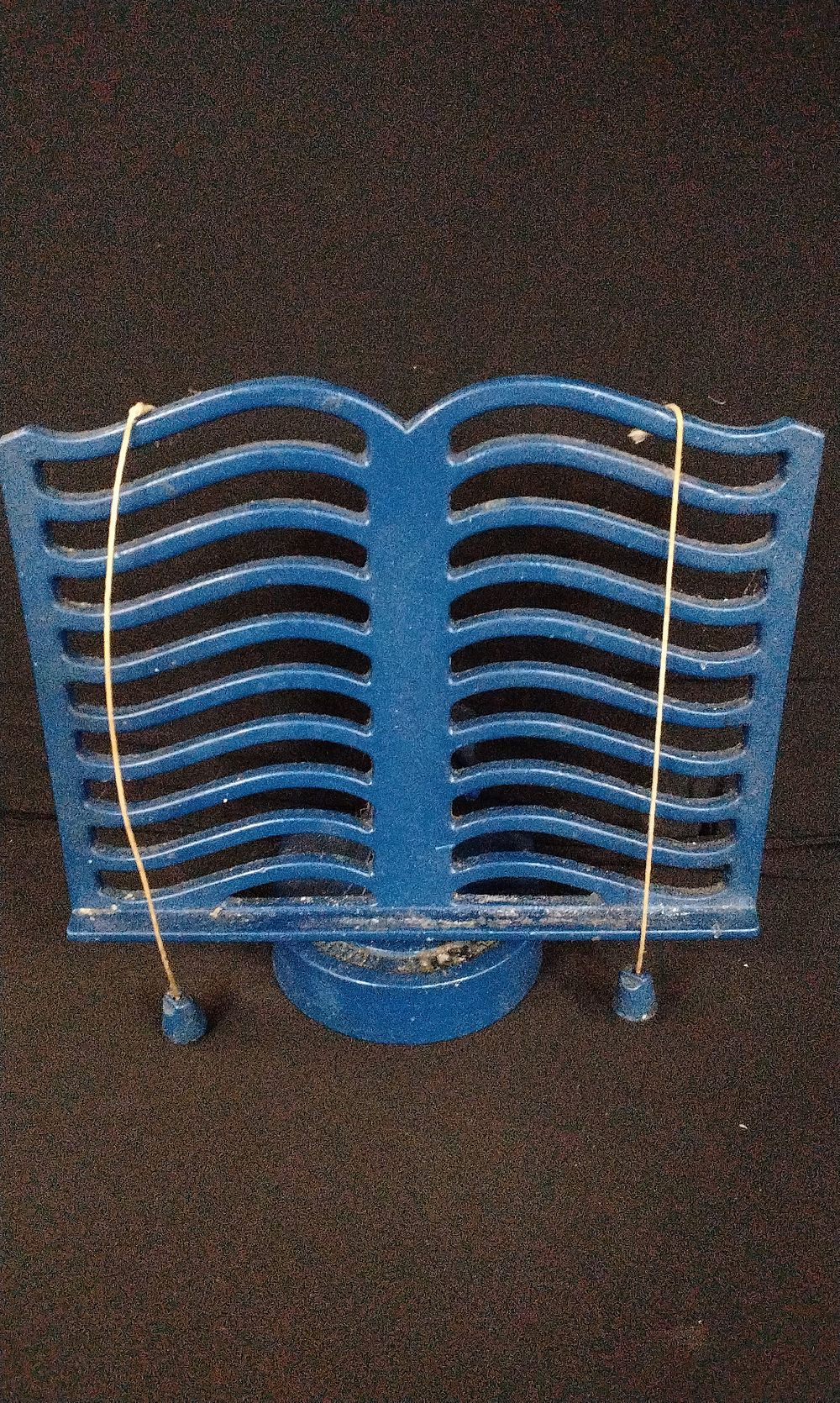 Lot 279: Victor England Blue Enamelled Cast Iron Book Rest