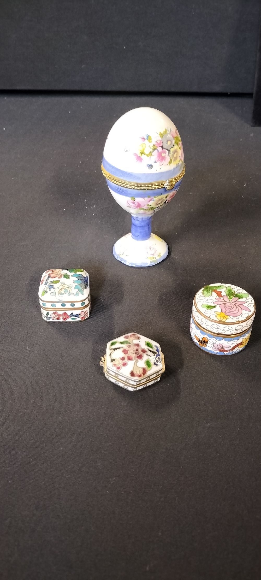 Lot 309: Three Small Enameled Pill Boxes and an Egg Shaped Porcelain Trinket Box