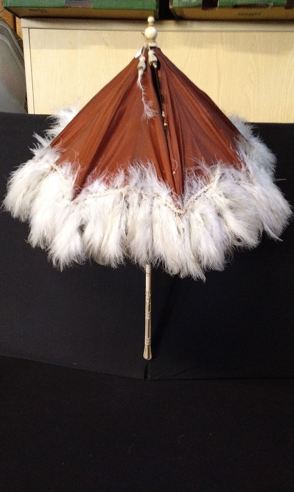 Lot 314: Silk Lined Parasol with Feather Edging and Folding Handle