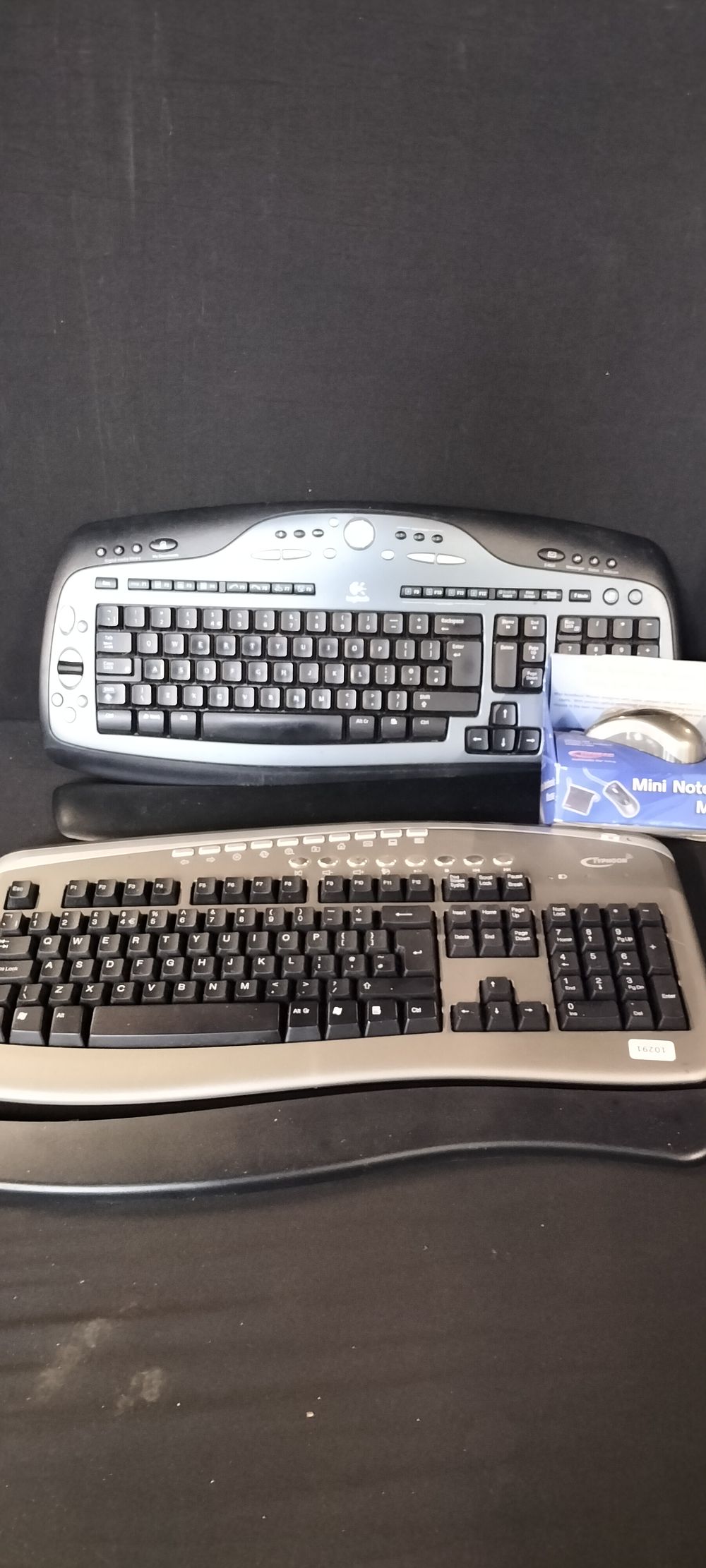 Lot 326: Two Wireless Keyboards with Wrist Rests and a New Mini Notebook Mouse