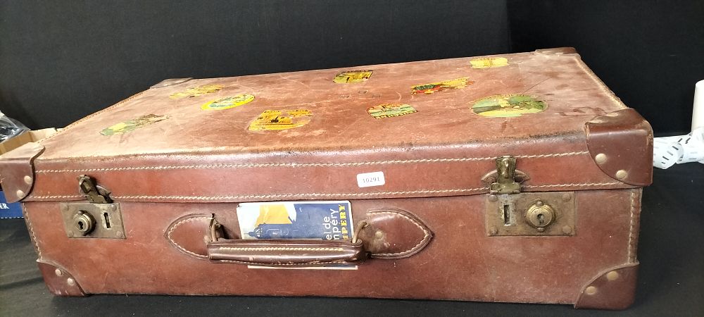 Lot 328: Vintage Leather Travel Suitcase with Travel Stickers
