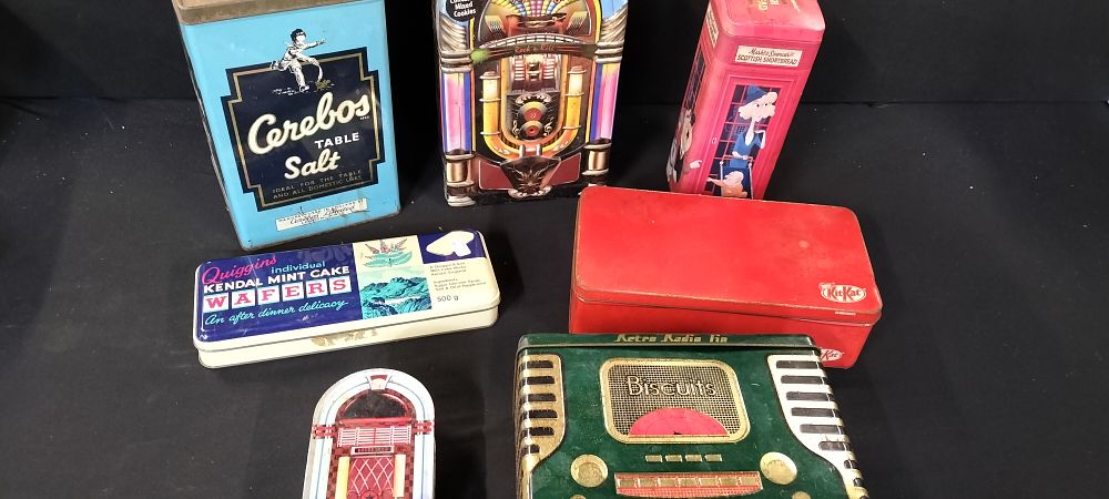 Lot 362: Seven Metal Advertising Tins for Biscuits, Kendal Mint Cake and Cerebos Salt amongst them