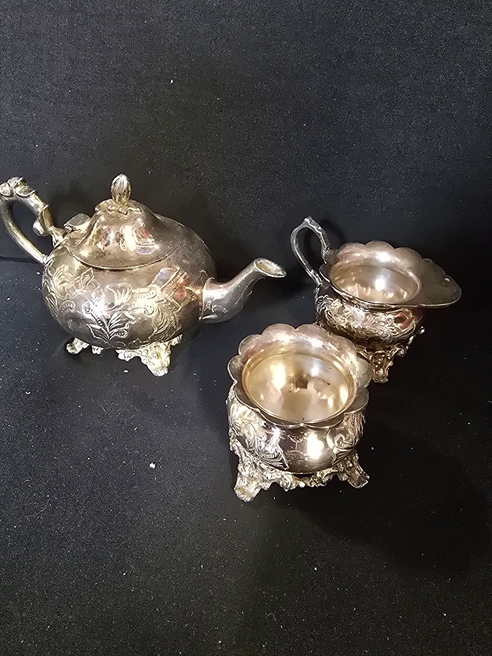 Lot 445: Three piece silver plate tea set