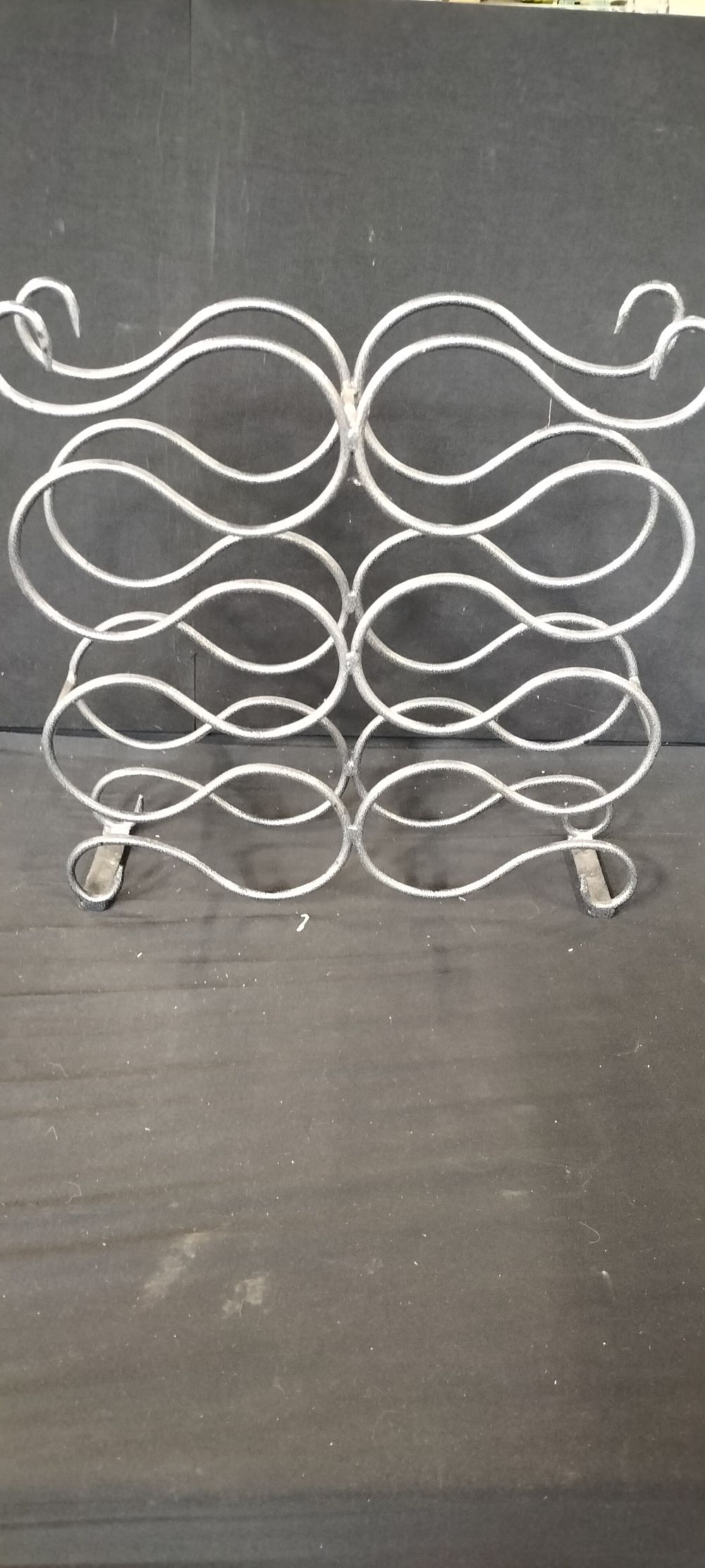 Lot 397: Decorative Wrought Iron Wine Bottle Rack for Ten Bottles