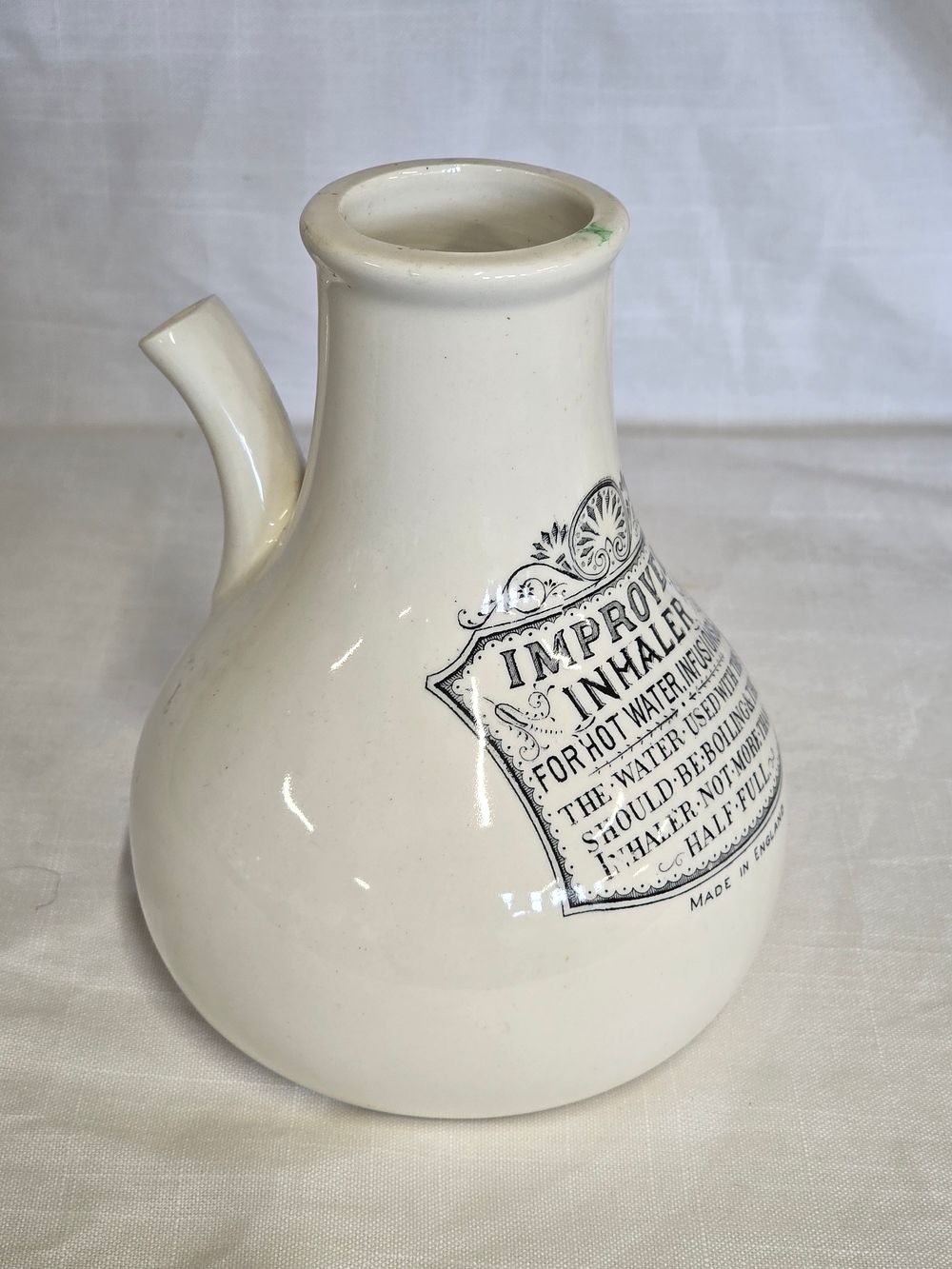 Lot 450: Vintage ceramic inhaler