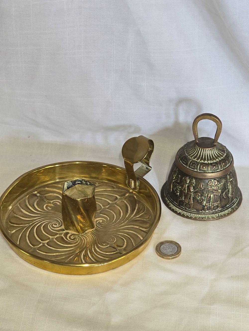 Lot 460: Vintage brass chamberstick and vintage heavy brass bell