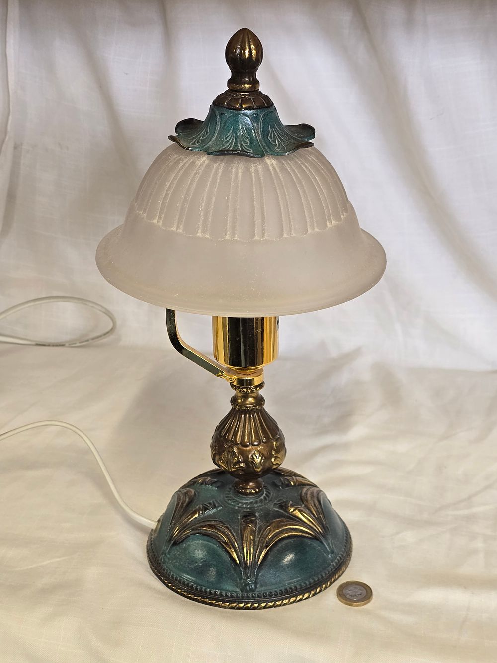 Lot 478: Cast metal brass effect table lamp with frosted glass added