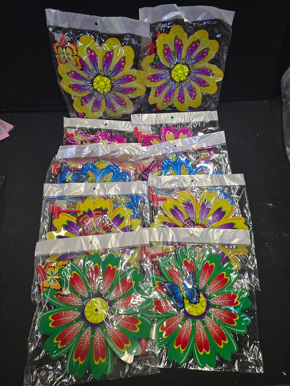 Lot 464: Ten brand new garden flower and butterfly windmill