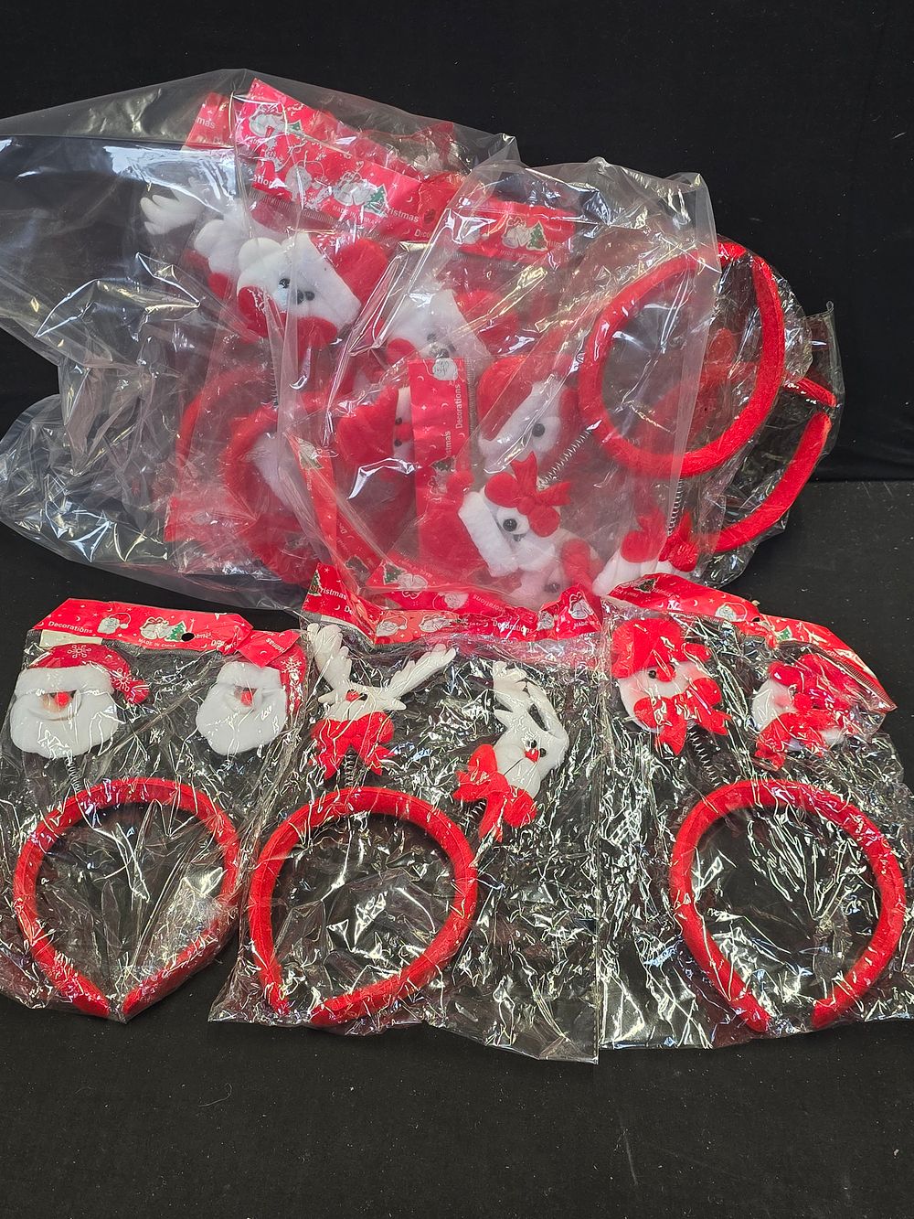 Lot 469: Twelve brand new Christmas themed head bands.