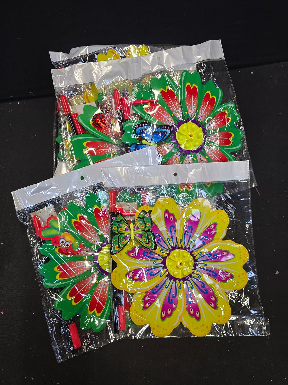 Lot 482: Ten brand new flower and butterfly garden decorations