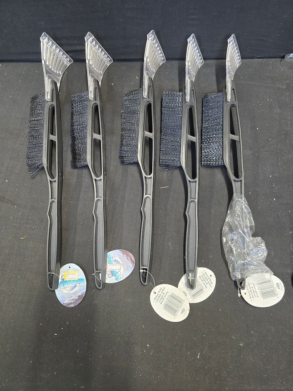 Lot 487: Five brand new heavy duty double action scrape and brush away scrappers
