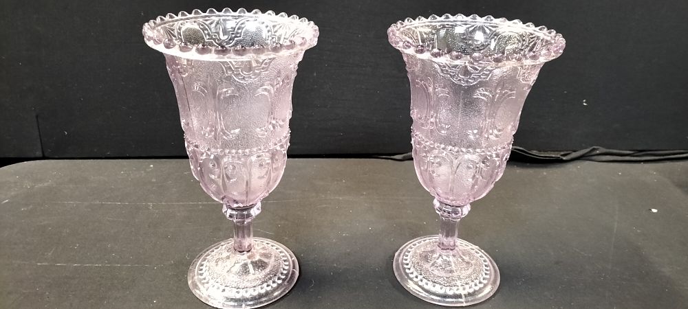 Lot 491: A Pair of Victorian Pressed Glass Celery Vases, with a Subtle Purple Hue,