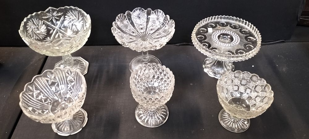 Lot 492: A Collection of Six Vintage Crystal Pressed Glass Fruit Bowls and a Cake Stand