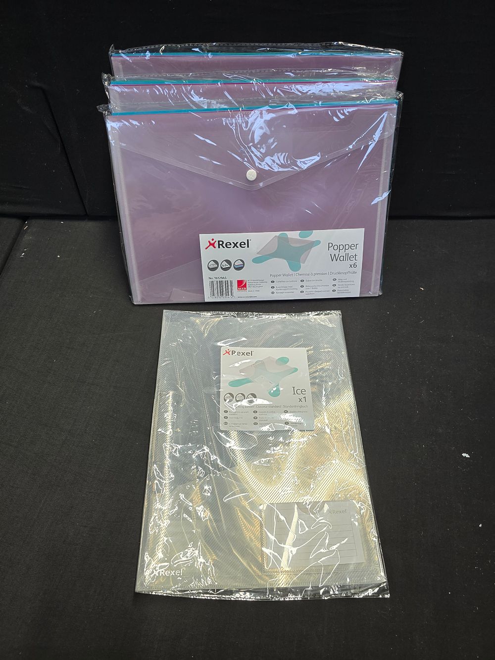 Lot 494: Brand new rexel popper wallets and one ice clear reel ring binder