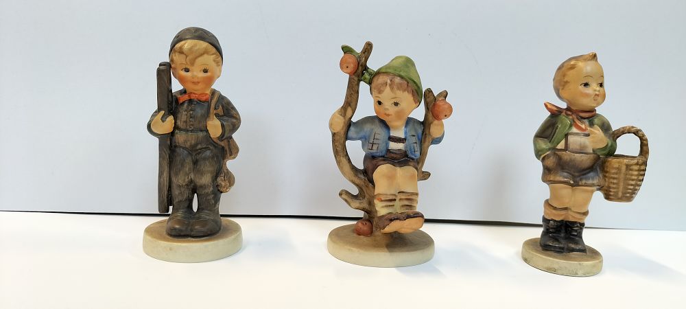 Lot 309: Three Vintage Goebel/Hummel Figures. Chimney Sweep, Apple Tree...