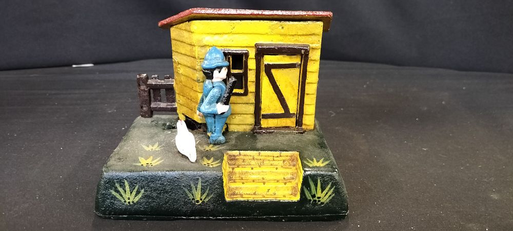 Lot 232: J. & E. Stevens Co. Uncle Remus Mechanical Bank, 1883