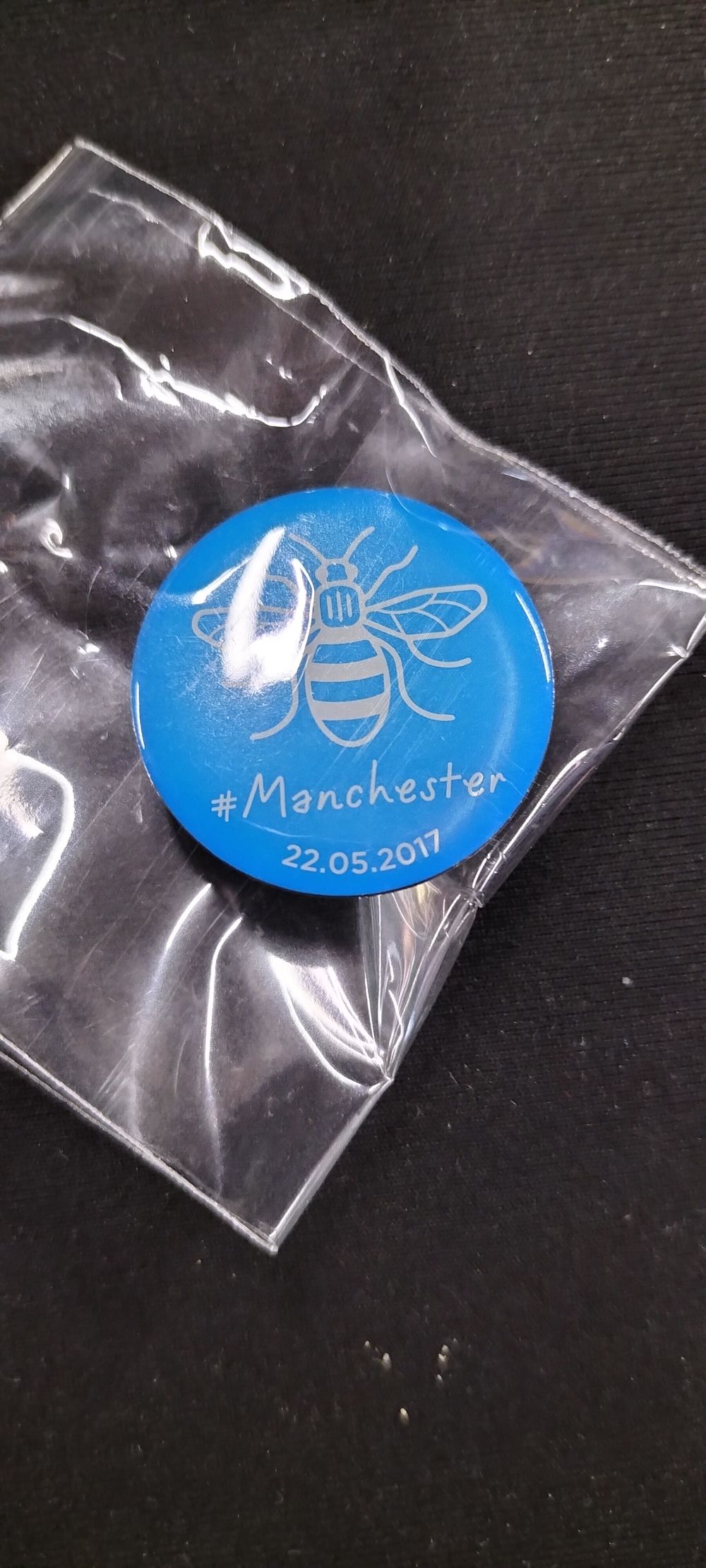 Lot 246: A Collection of Manchester Bee Button Pins