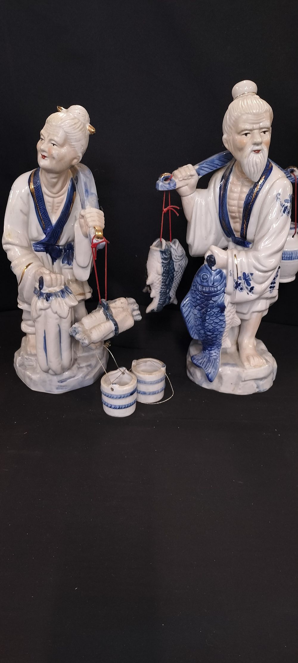 Lot 257: A Pair of Chinese Blue and White Ceramic Figurines
