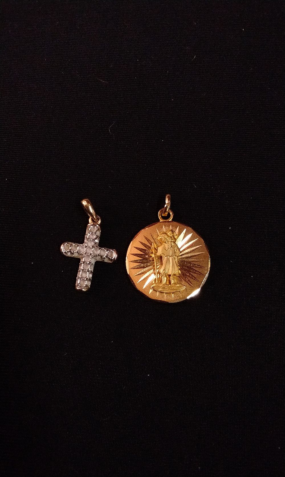 Lot 324: A Pair of Gold-Colored Cross and Medallion Pendants