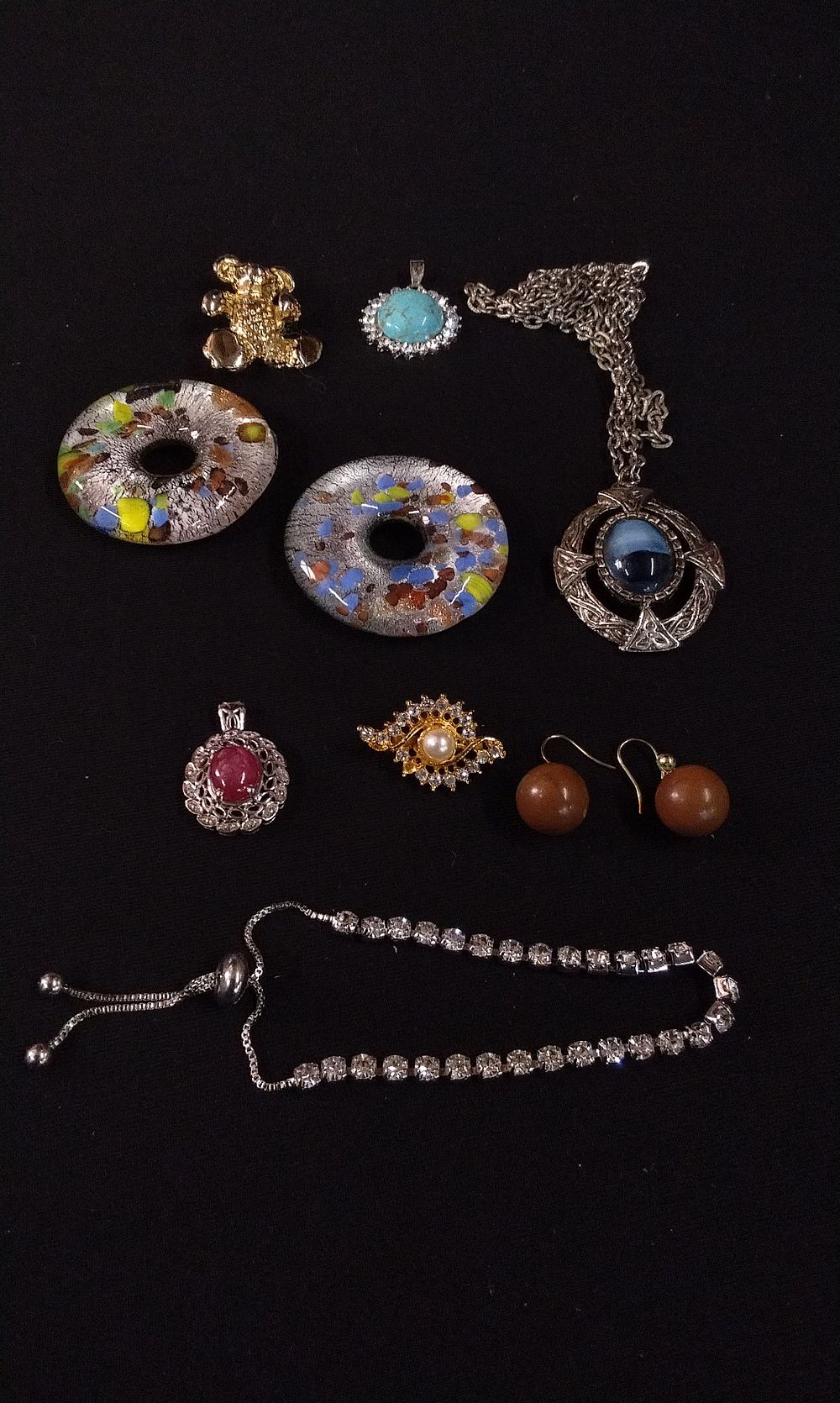 Lot 326: A Group of Brooches, Pendants, Earrings, and Bracelet
