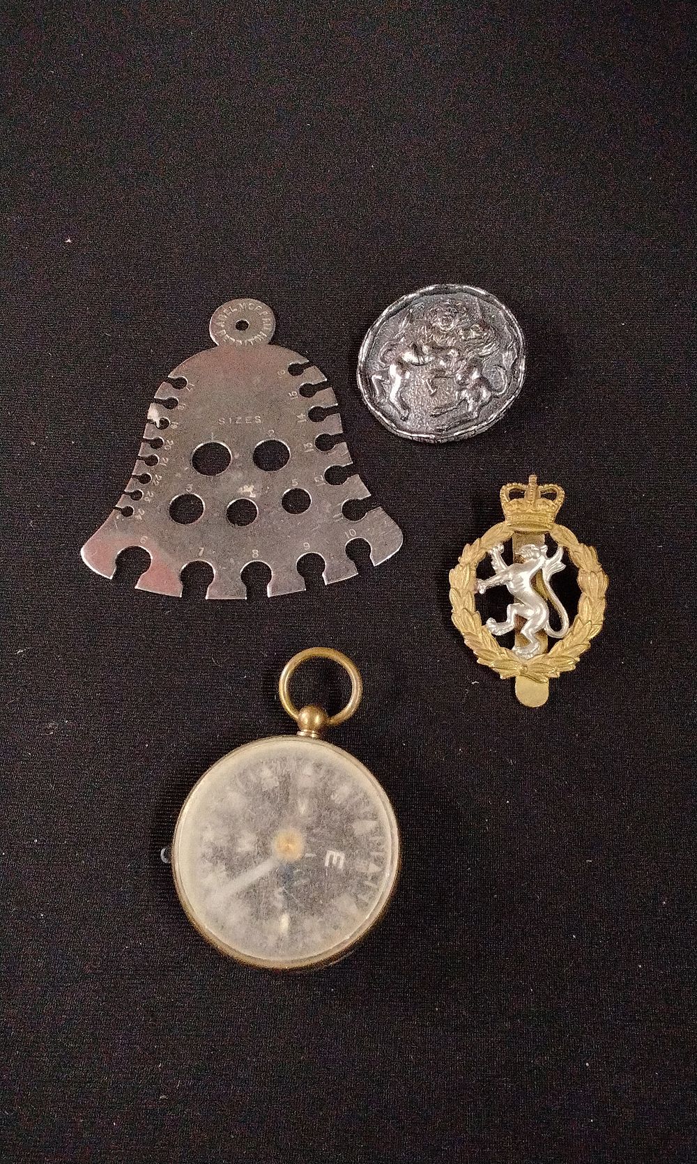 Lot 332: A Group of Collectibles Including a Pocket Compass