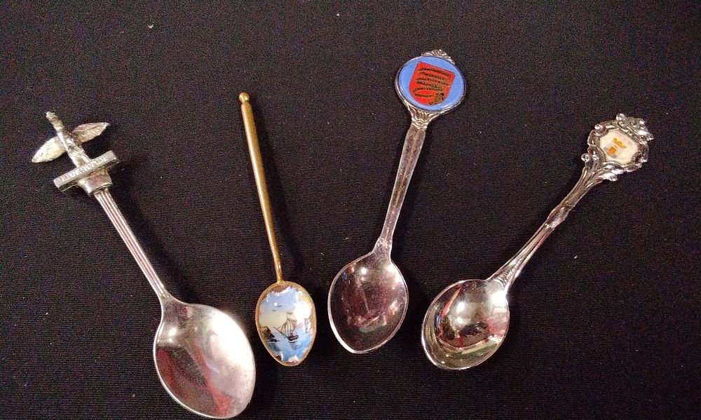 Lot 335: Four Souvenir Spoons with Enamel Designs