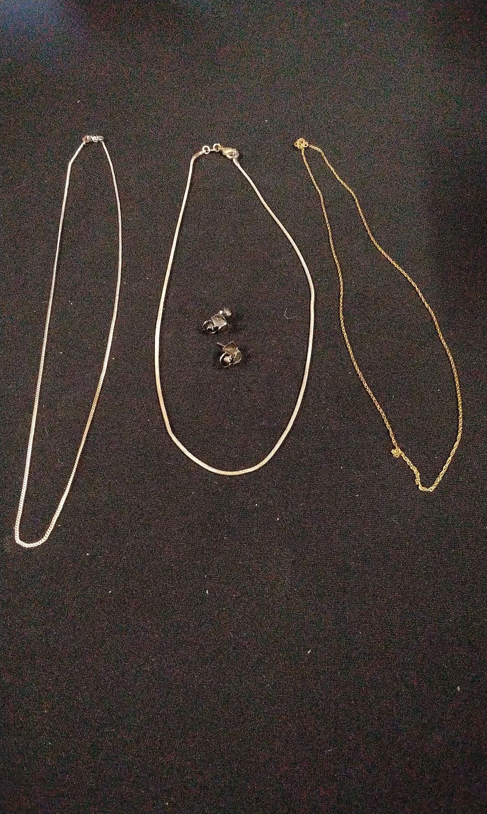 Lot 342: Three Silver and Gold-Colored Necklaces and Earrings