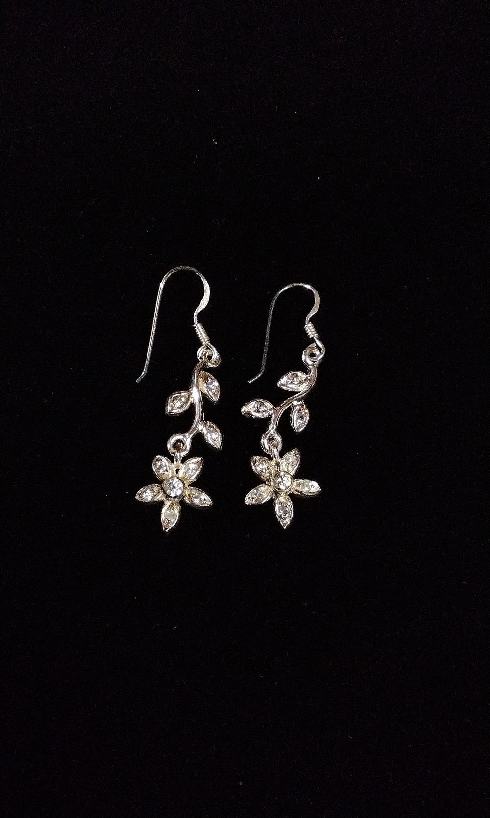 Lot 351: A Pair of Silver-Toned Dangle Earrings with Vine and Flower Design