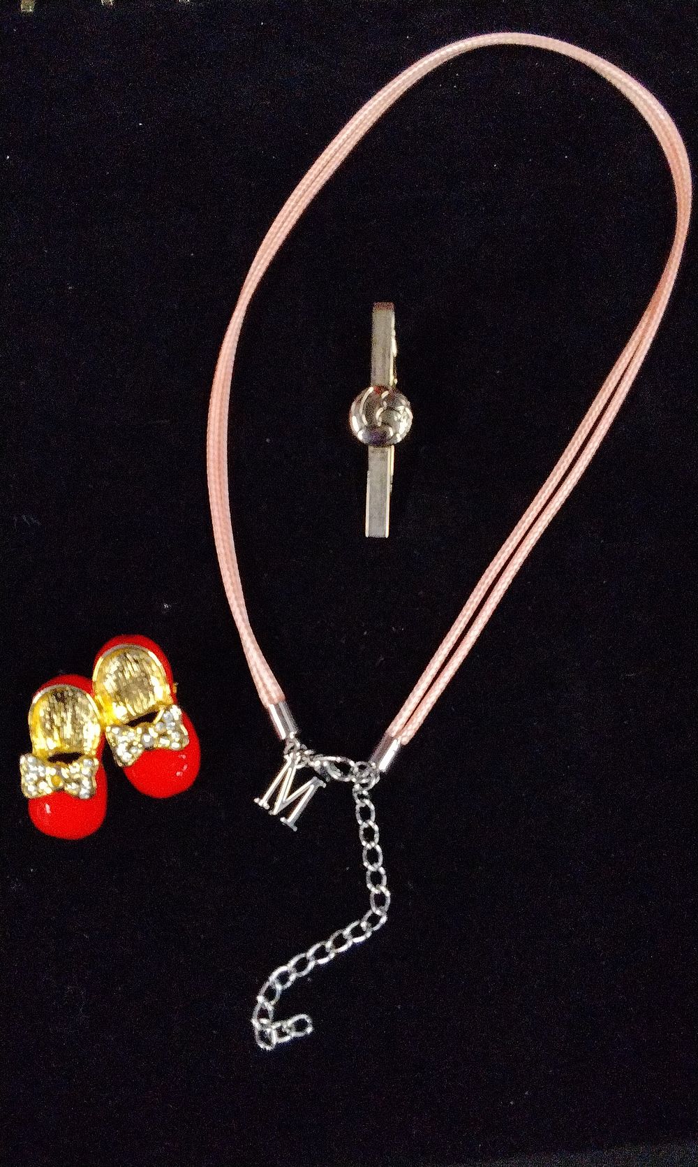 Lot 361: Pink Cord Choker, Tie Clip, and Baby Shoe Earrings
