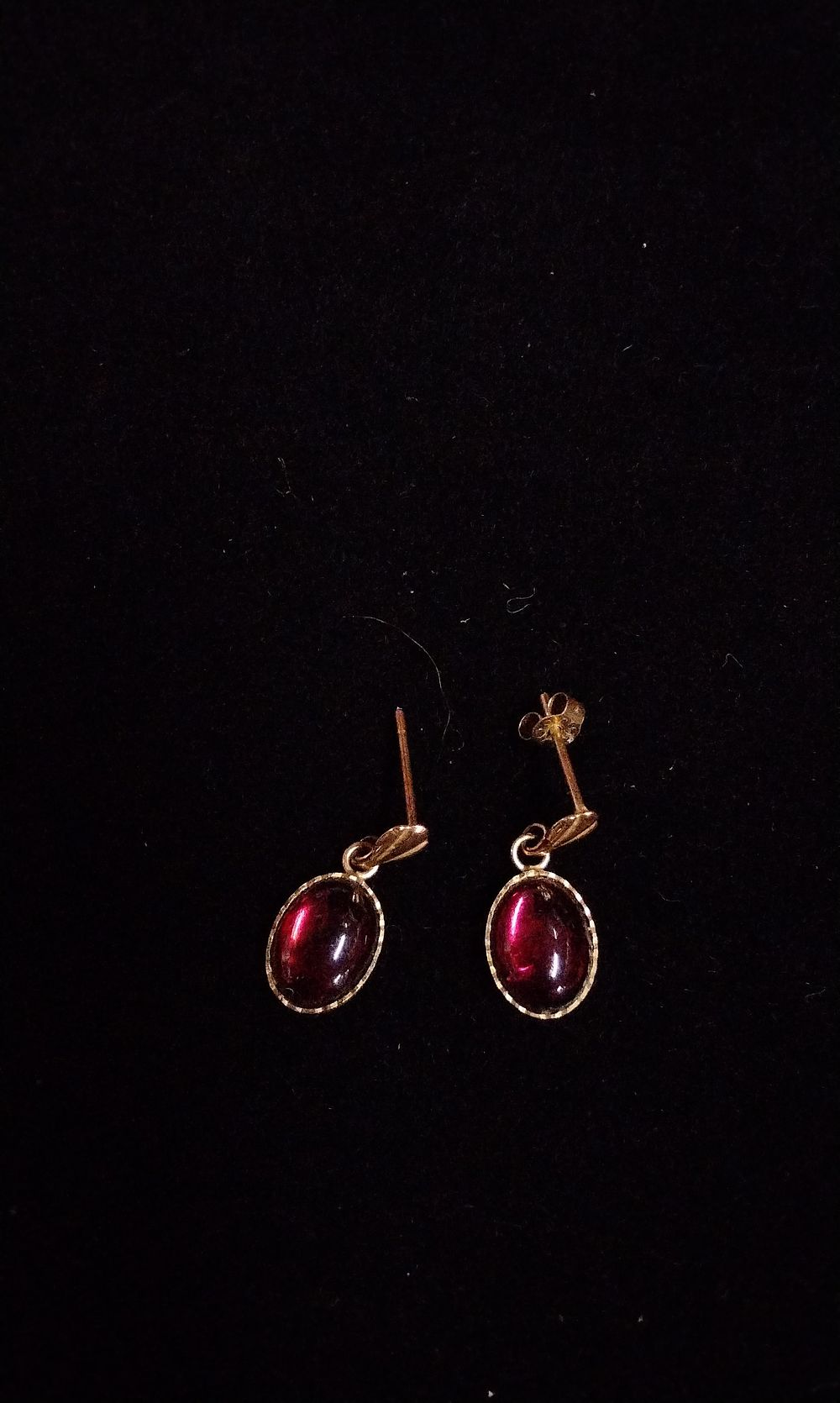 Lot 364: A Pair of 9ct Gold Cabochon Red Stone Earrings