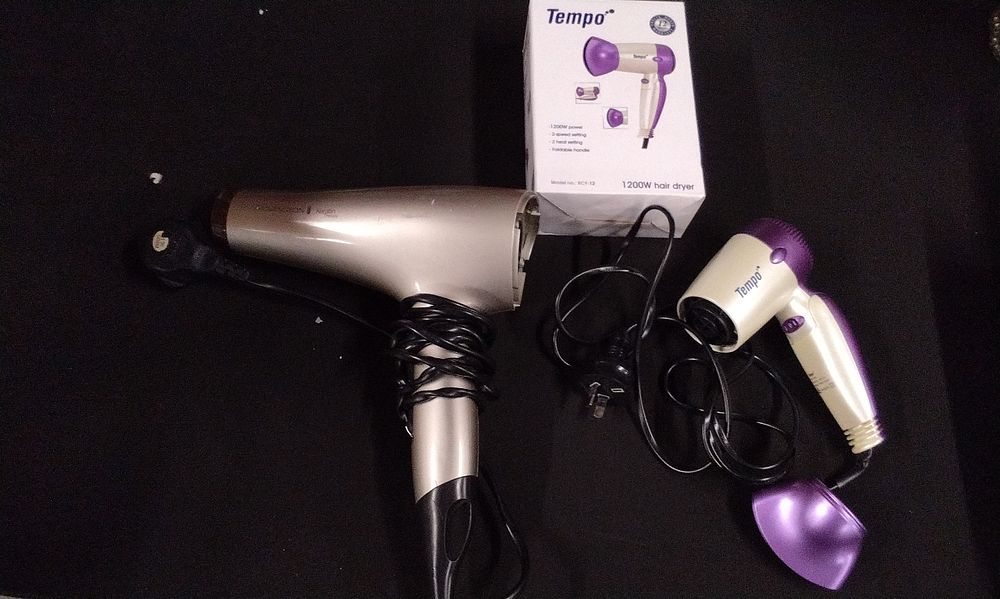Lot 373: A Pair of Remington and Tempo Hair Dryers