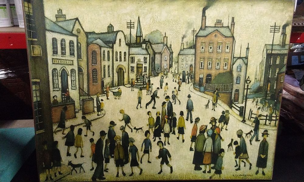 Lot 379: Ganymed Reproduction After L.S. Lowry's 'A Village Square'.measures Approx 18 x 24 inch
