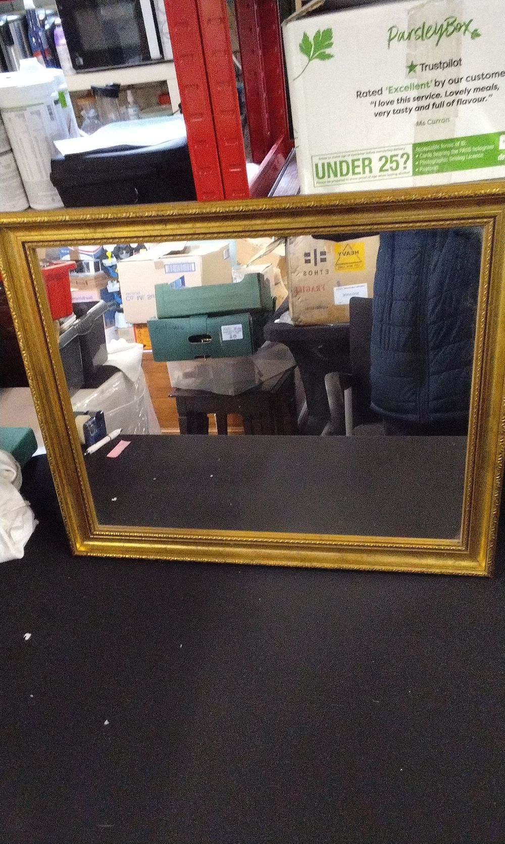Lot 390: A Gilt-Framed Beveled Glass Mirror