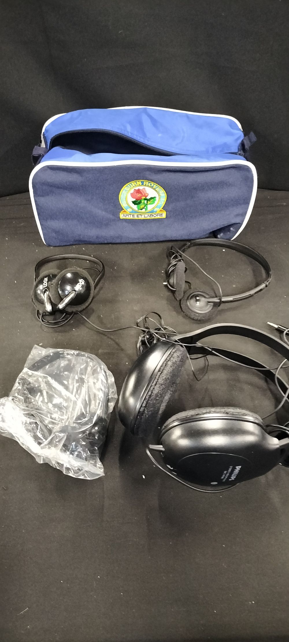 Lot 263: A Sports Bag and Three Pairs of Headphones