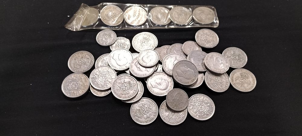 Lot 268: A Collection of Silver-Colored British Florin Two Shillings Coins