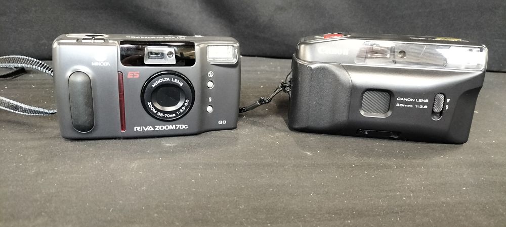 Lot 271: Two Minolta Riva Zoom 70c and Canon Snappy EZ Cameras