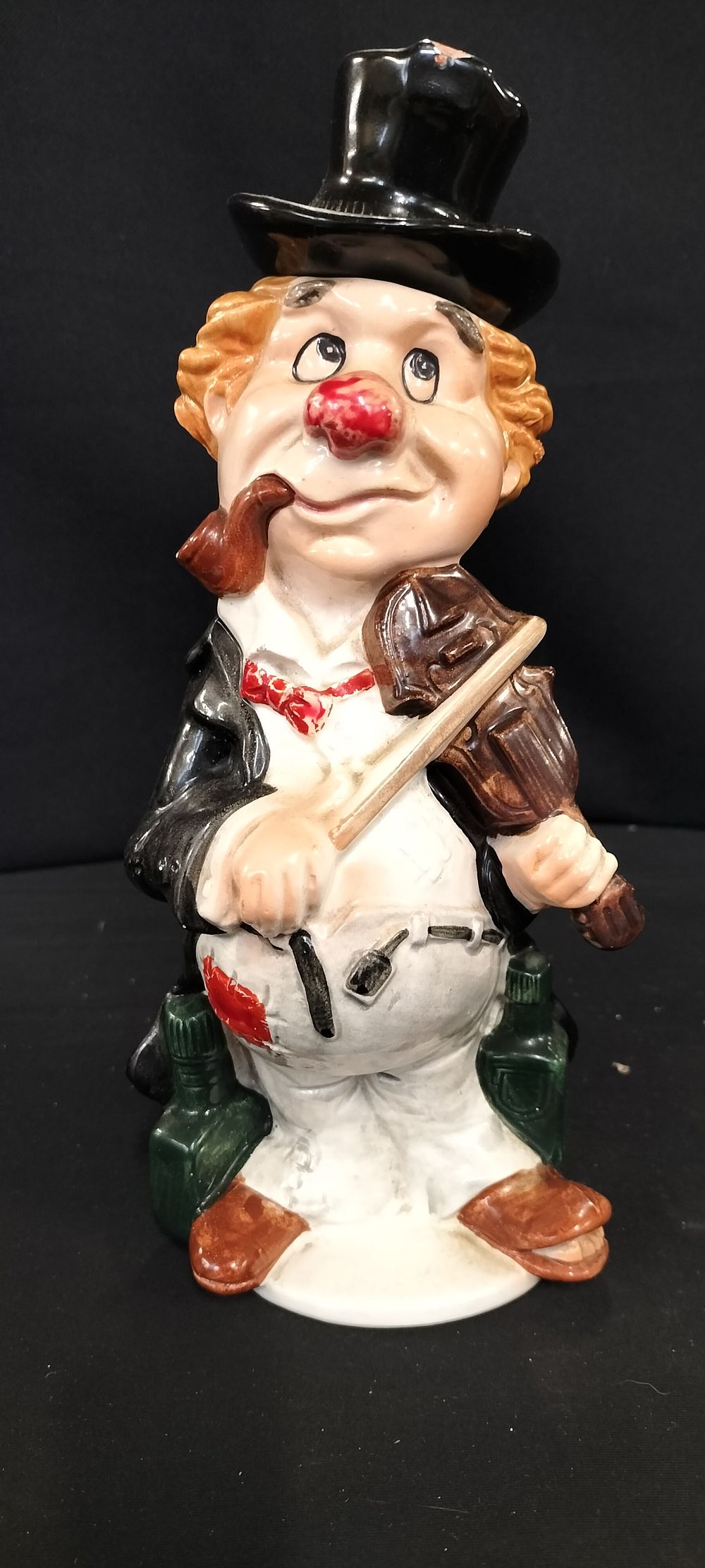 Lot 275: Vintage Ceramic Hobo Clown Musical Decanter