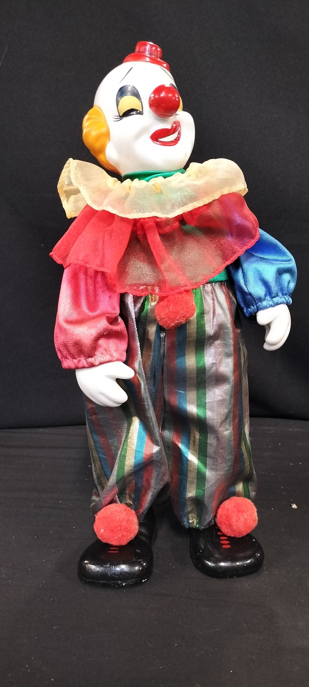 Lot 277: A Mechanical Musical Porcelain Wind-Up Clown Doll