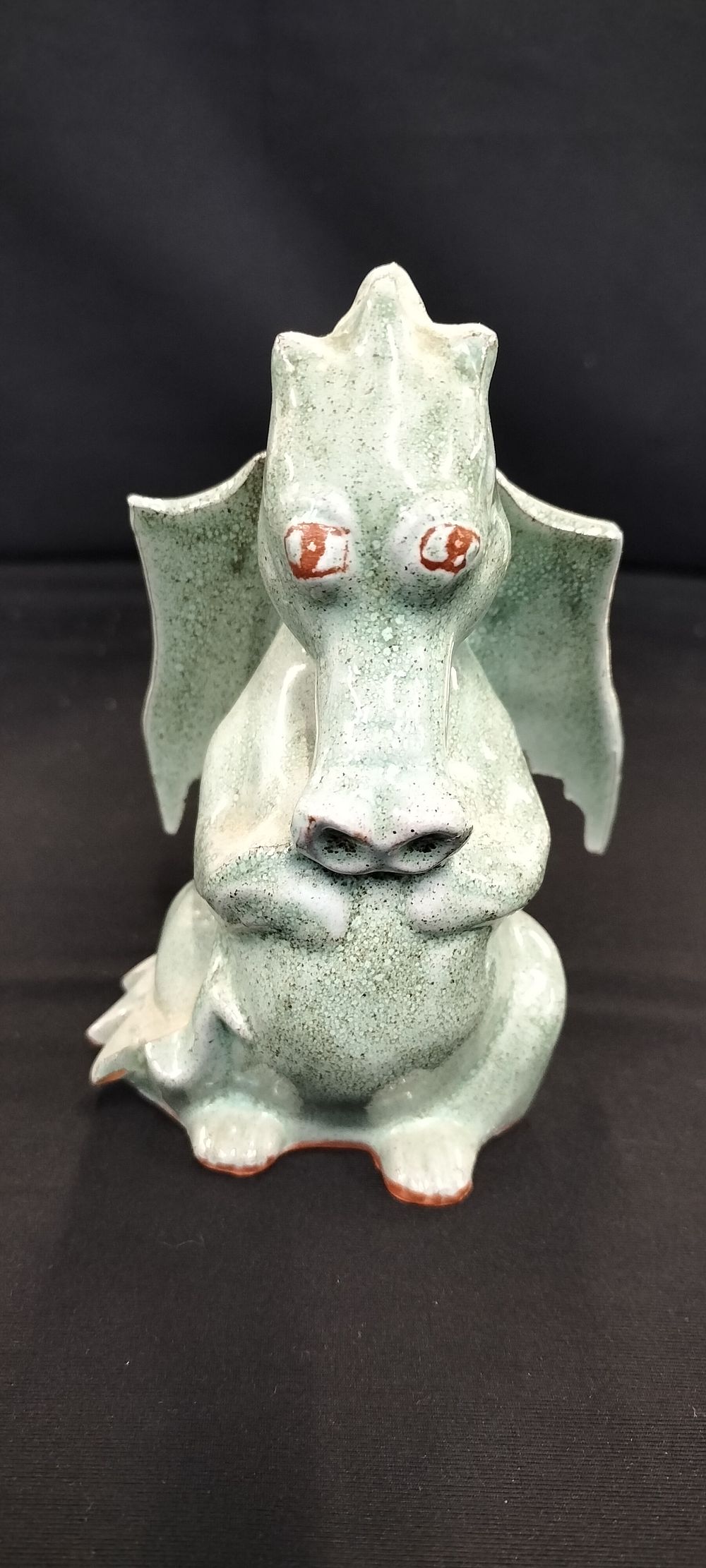 Lot 284: A Speckled Ceramic Seated Dragon Figurine, Dated 1988
