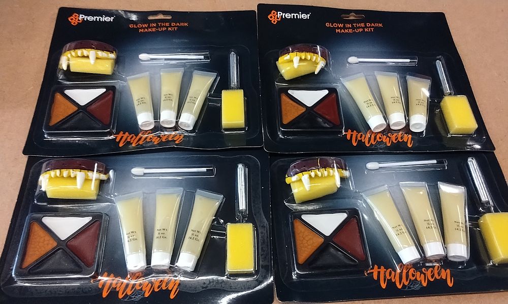Lot 168: A Set of Four Premier Glow in the Dark Halloween Make-up Kits
