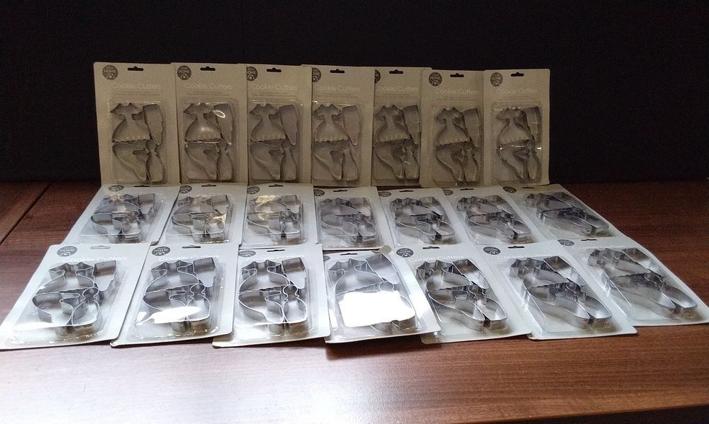 Lot 173: A Set of 21 'YOUR HOME' Cookie Cutter Packages