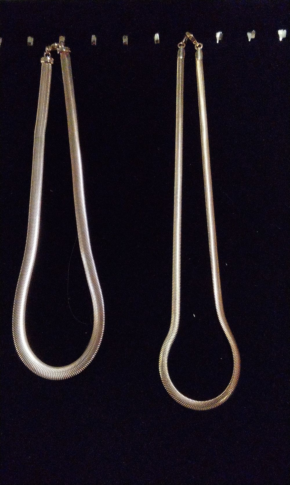 Lot 195: Two Gold-Toned Herringbone Snake Chain Necklaces