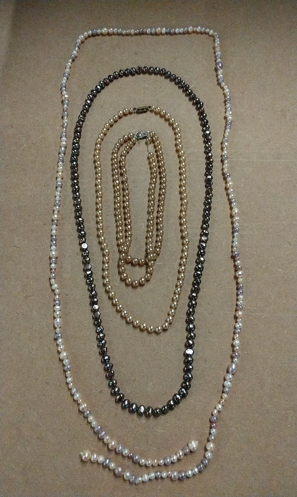 Lot 202: Four Assorted Pearl Necklaces