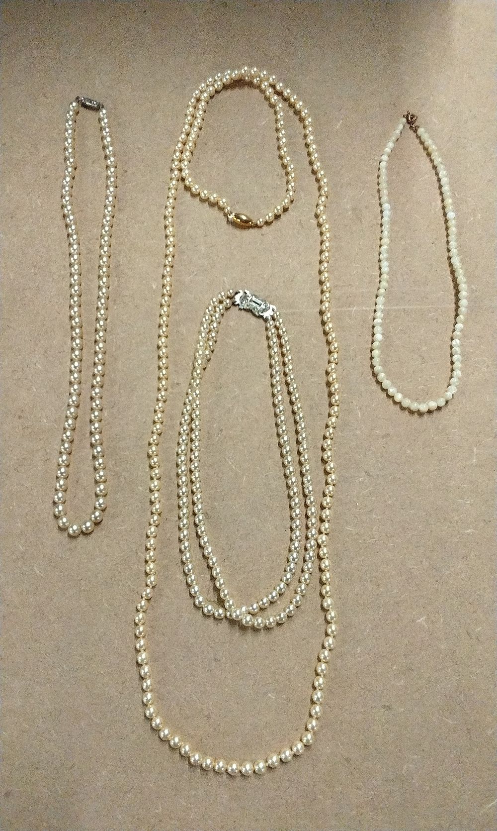 Lot 203: Four Pearl Necklaces, Various Lengths and Styles