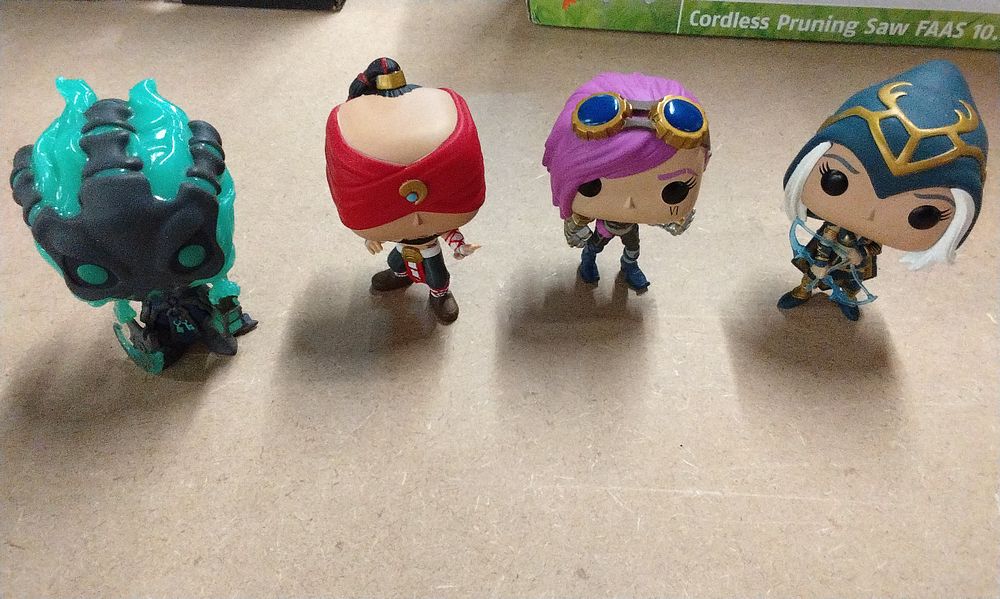 Lot 234: A Group of Four Funko Pop! League of Legends Figures